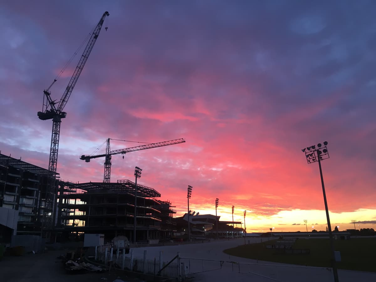 Commercial construction site showing subcontractor work and quantity surveying services